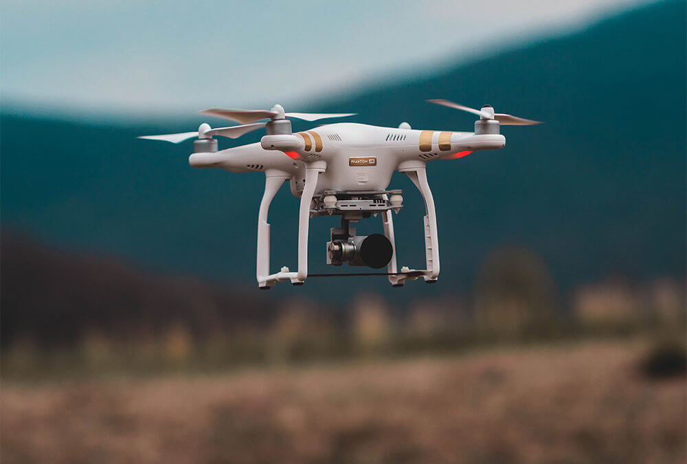 Why use drones to conduct aerial surveys?